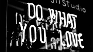 Photo of a neon sign that says 'Do what you love'