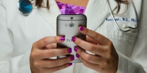 Image of a doctor using a mobile phone