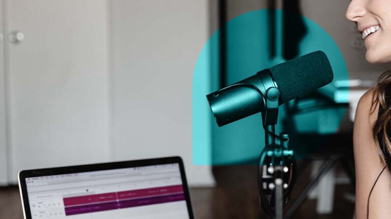 Image of a person speaking into a mic during a podcast