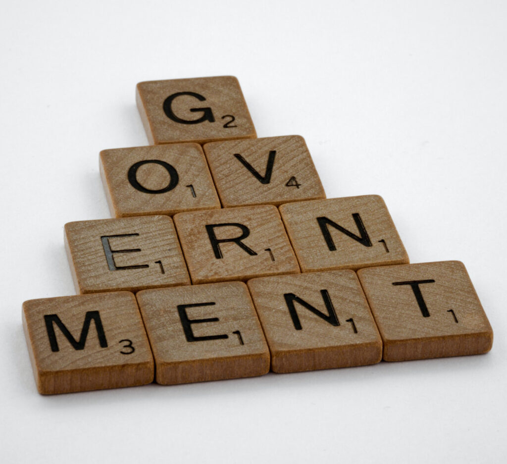 Scrabble pieces forming a word 'Government'