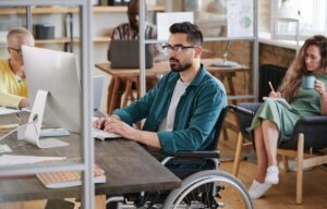 Professional with a Disability Working on Computer